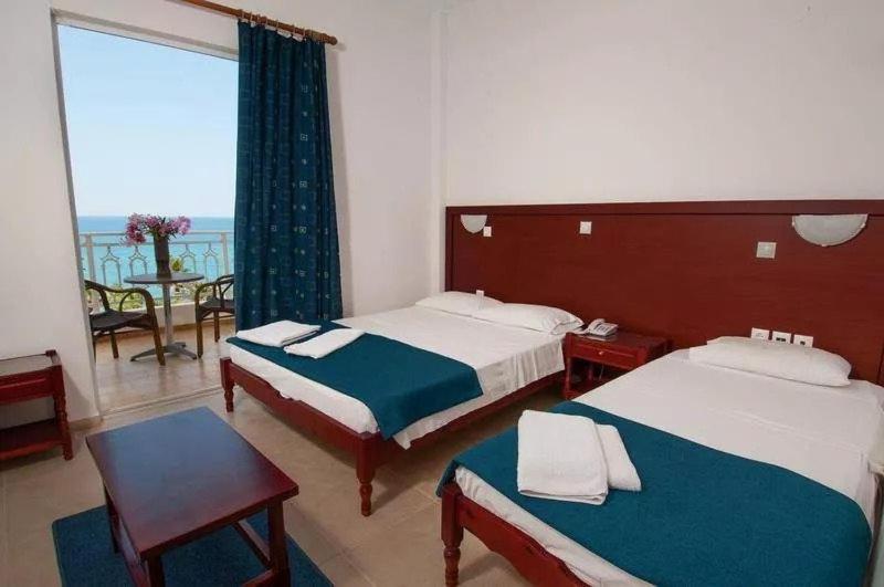 Poseidon Beach Hotel Kastrosikia Bagian luar foto